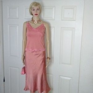 Two-piece Cami and skirt set with matching purse.